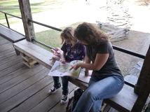 Reading over her Junior Ranger book