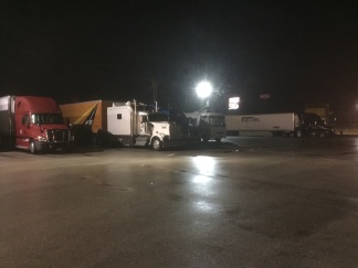 Our first night on the road. We look so small next to those semis!